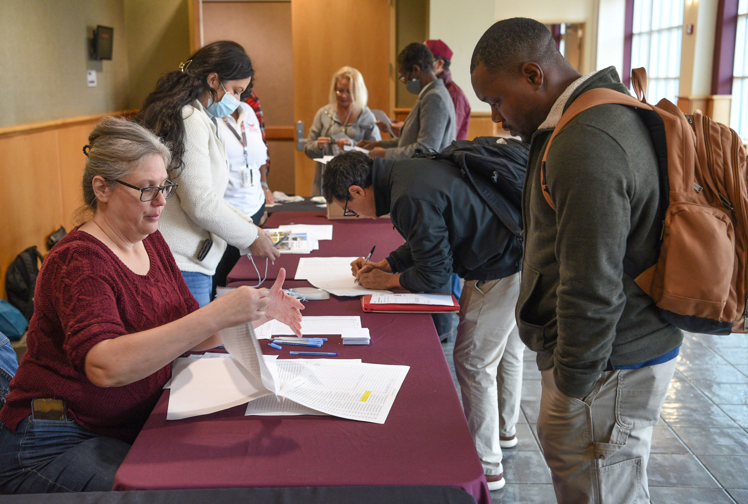 Small Farm Conference attendees check in.