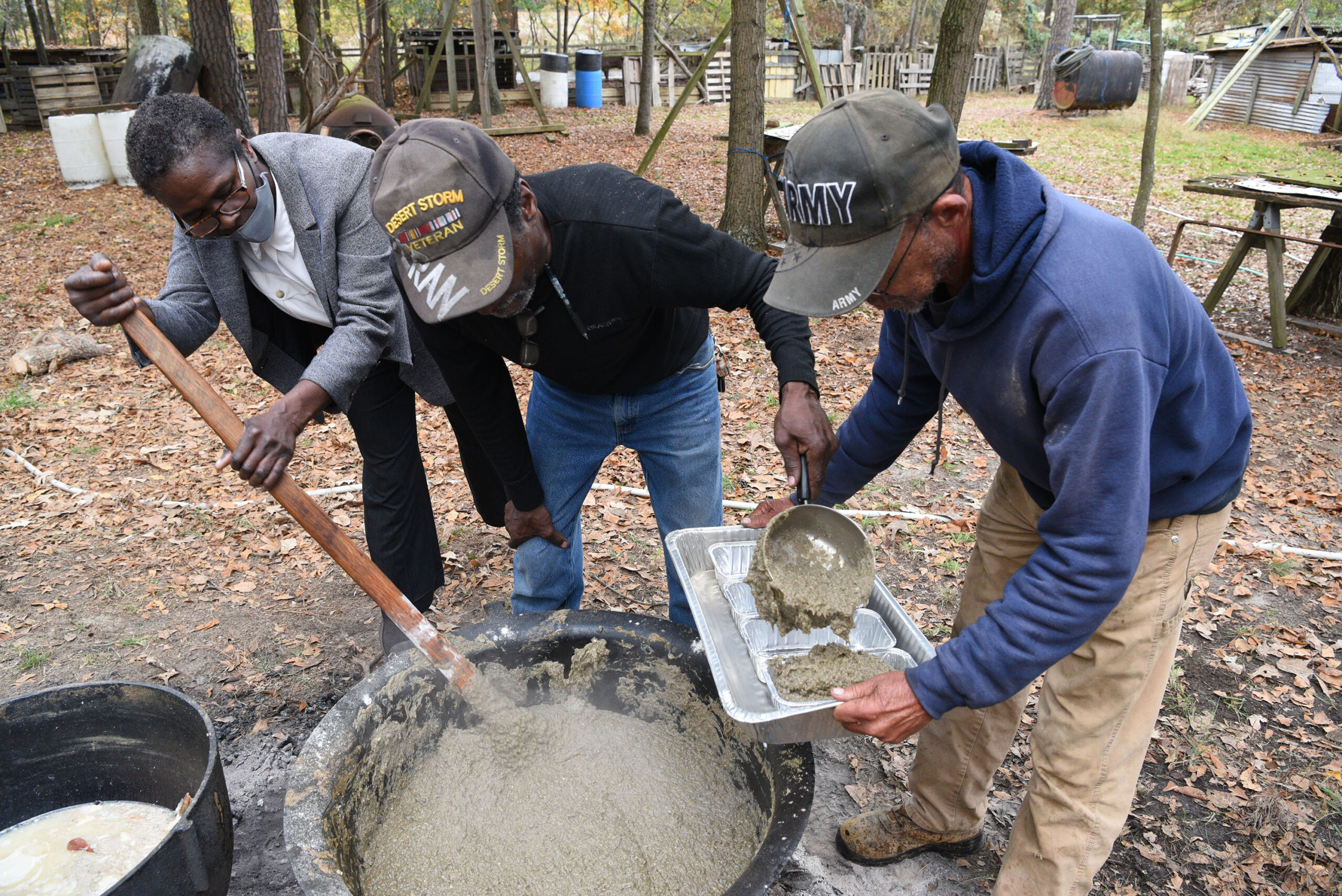 San Domingo community members make scrapple.