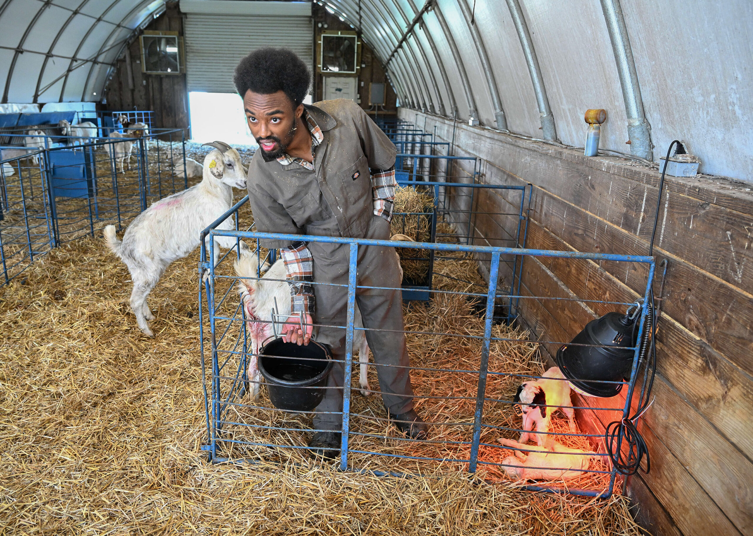 Student Donovan Grady works at the UMES farm.