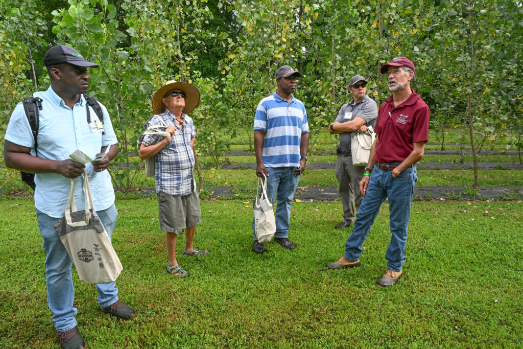 Dr. Jonathan Cumming talks to Ag Showcase visitors.
