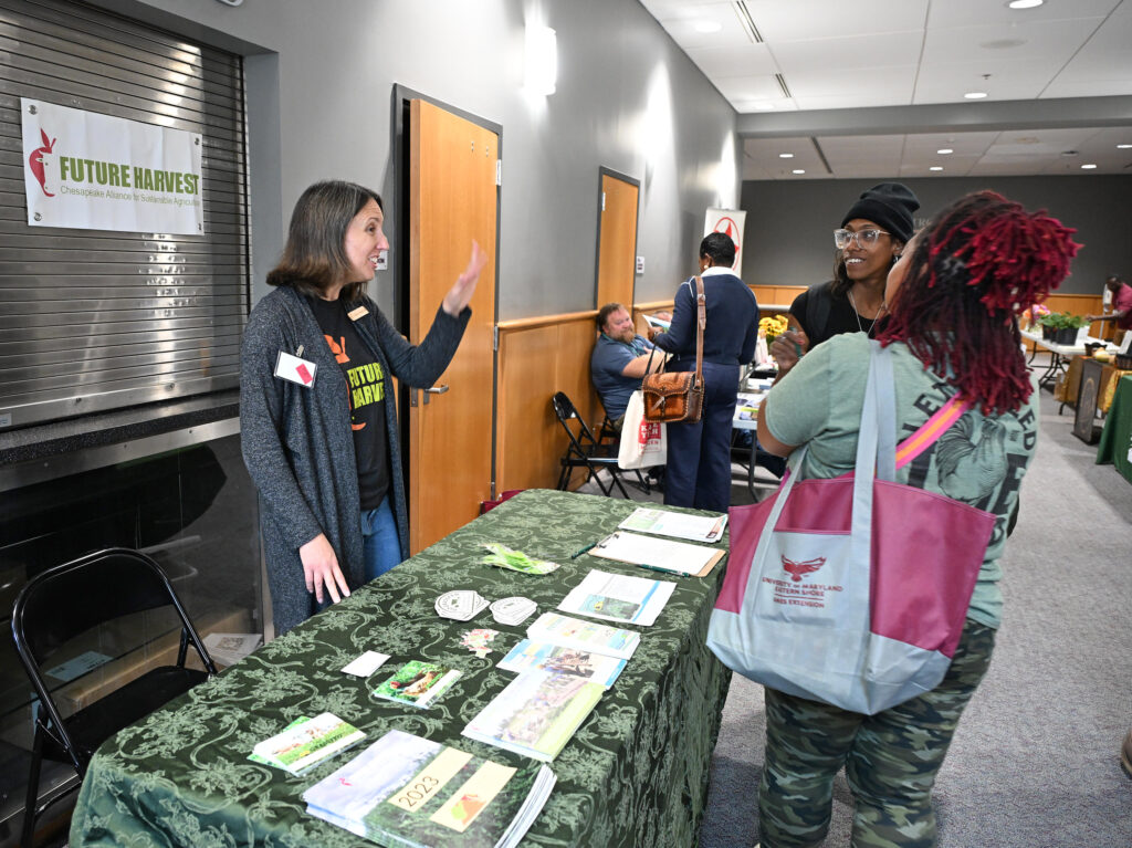 Attendees check out the vendors at 21st Small Farm Conference.