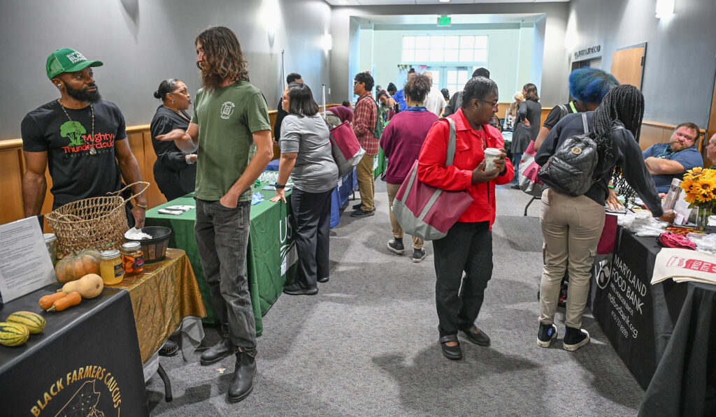 Attendees check out the vendors at 21st Small Farm Conference.