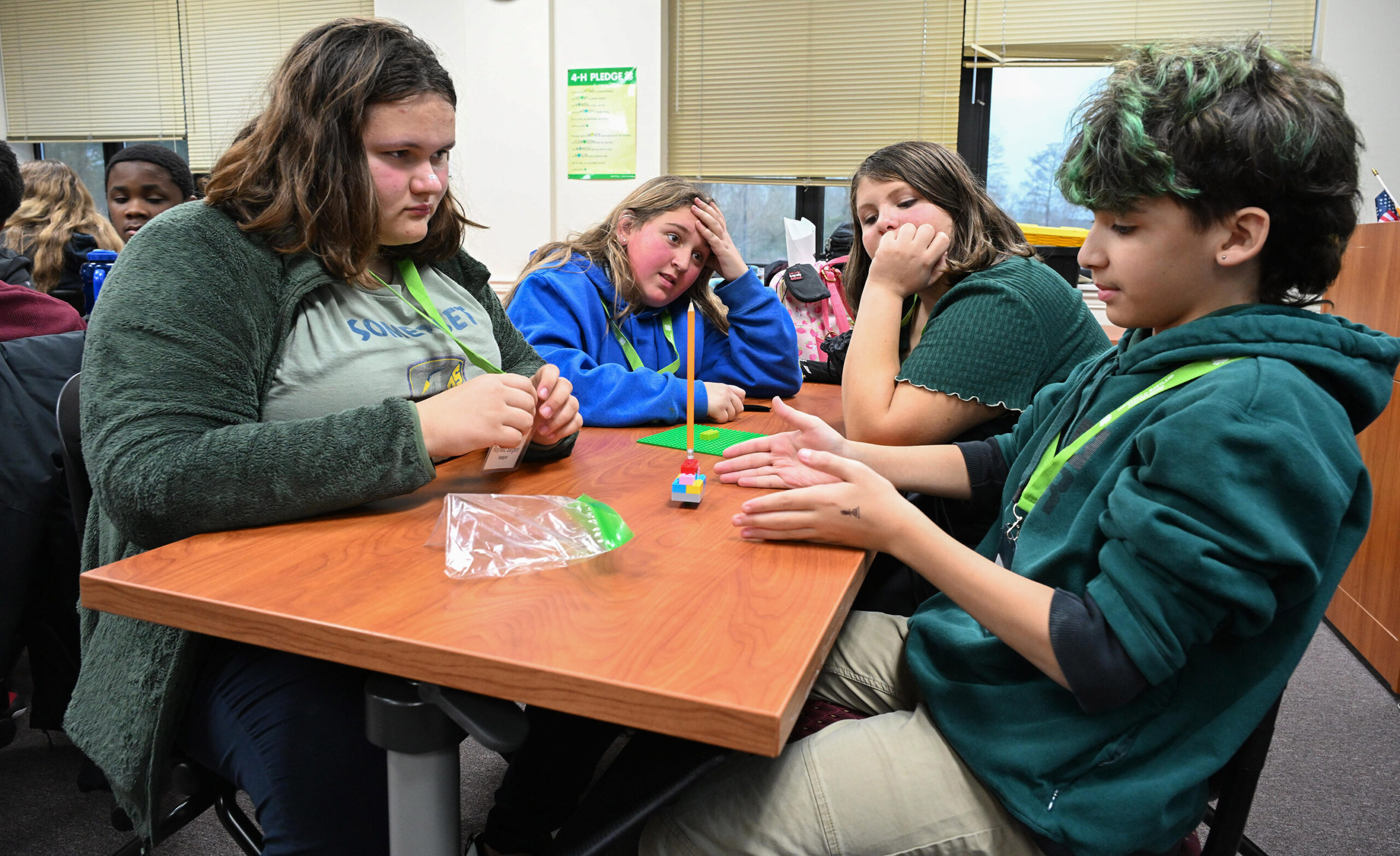 Somerset Intermediate School students Natalynn Rayfield-Sargent, Shelby Holland, Anna Gibson and Ali Koltuk conduct a LEGO experiment during their visit to the University of Maryland Eastern Shore, hosted by UMES Extension 4-H.