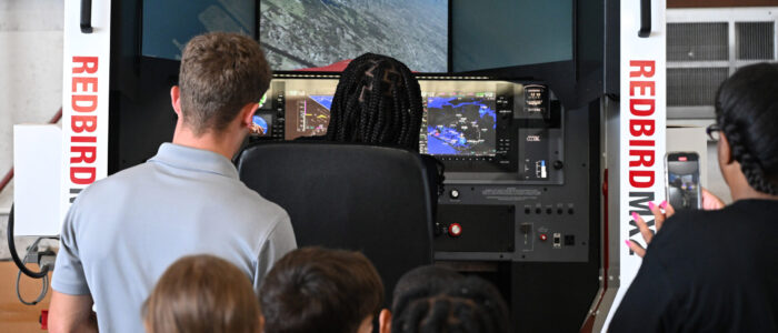 Horizons Delmarva summer camper checks out a simulator at Salisbury Airport during science program hosted by UMES Extension.