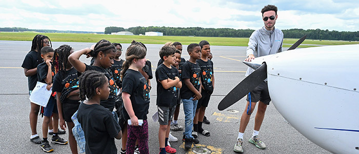Horizons Delmarva summer campers tour Salisbury Airport during science program hosted by UMES Extension.