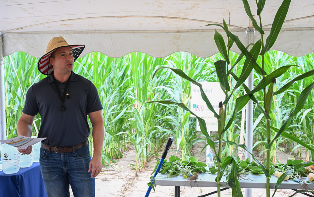 A Simplot Grower Solutions representative speaks to visitors at the 2025 Ag Showcase.