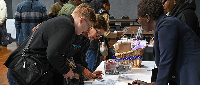 TGD-SMALLFARMS-102425-1217 Guests check in at 22nd annual Small Farm Conference.