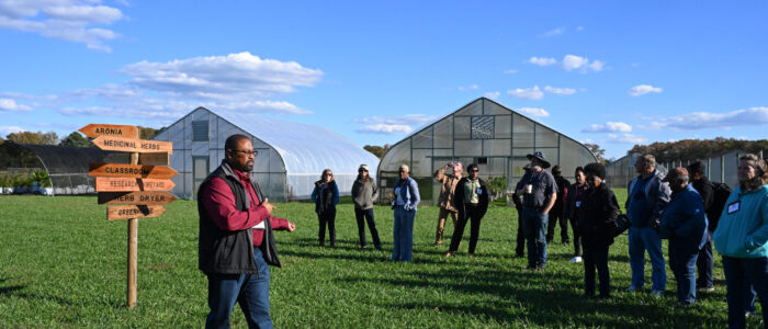 TGD-SMALLFARMS-102425-1499 Small Farm Program Coordinator Berran Rogers leads a tour of the UMES farm.