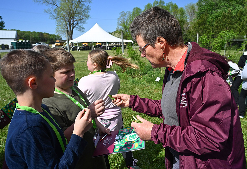 Students are introduced to herbs by UMES Extension specialist Henriette den Ouden.