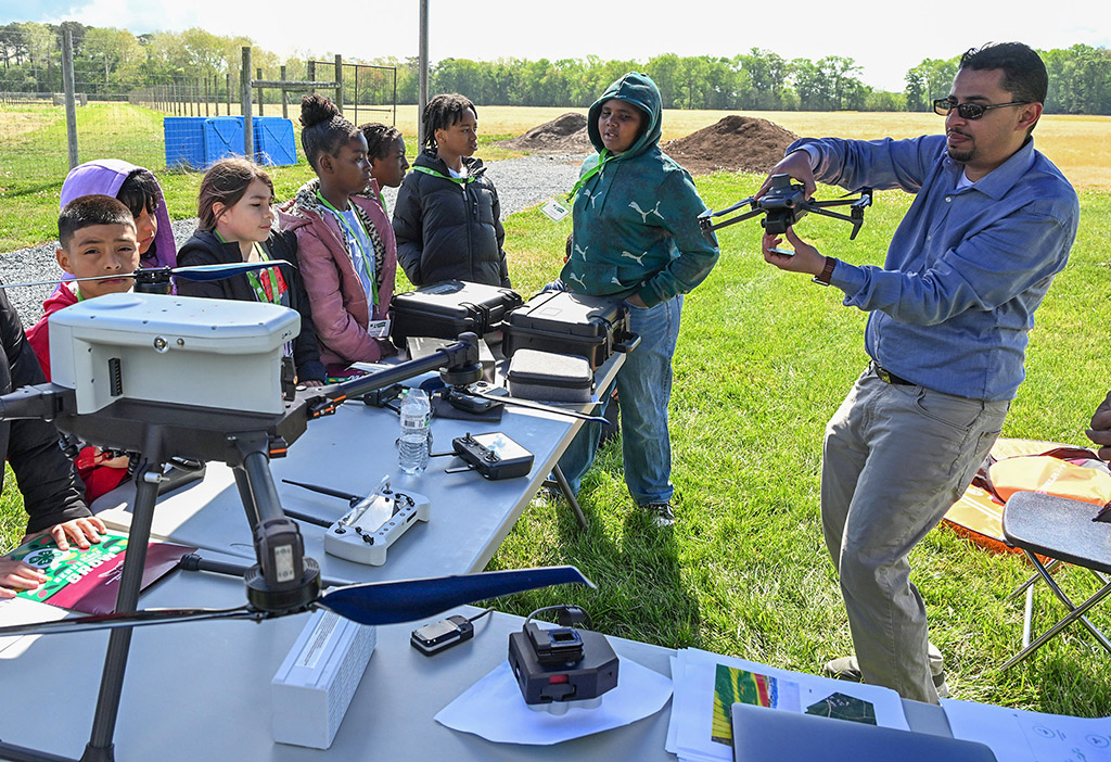 UMES Assistant Professor Alfadhl Alkhaled talks to students about drones.
