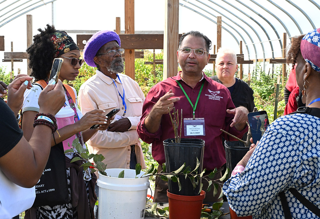 Dr. Naveen Kumar Dixit talks to veterans at the UMES Veterans Ag Conference.