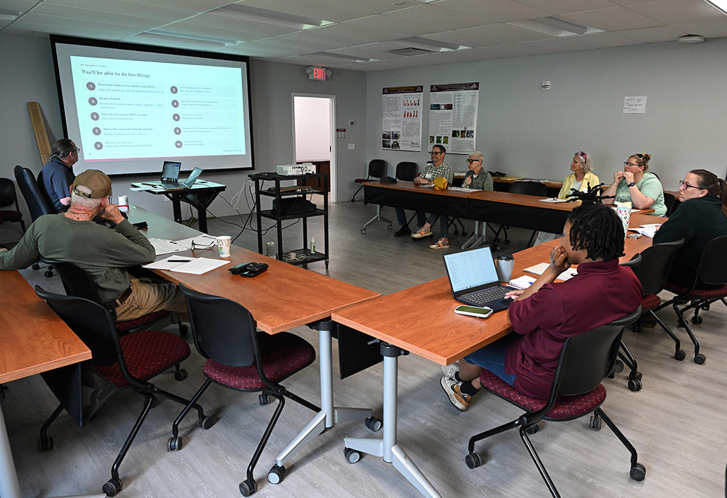 UMES Extension Program Assistant and beekeeper Stephen Goewey holds a workshop on performing first hive inspection in May 2026.