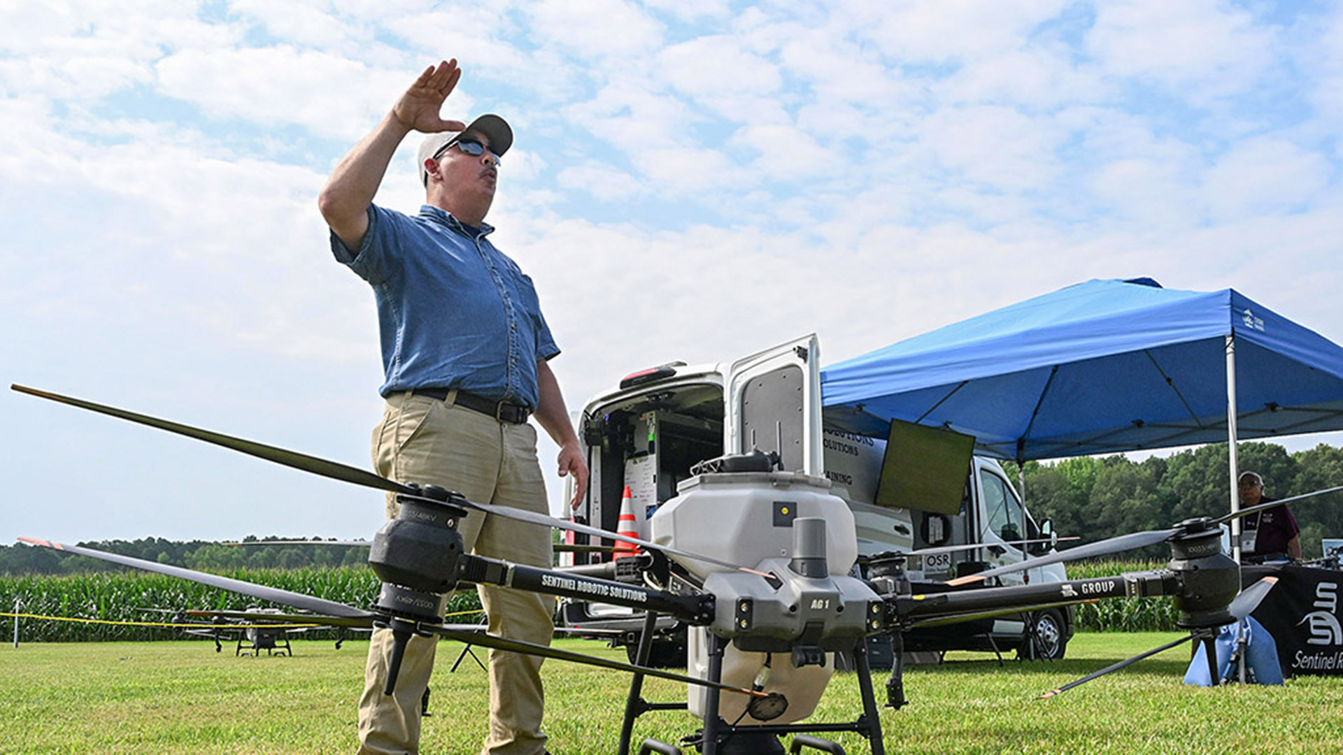 TGD-agshowcase-1519 Sentinel Robotics representative explains drone technology at Ag Showcase.