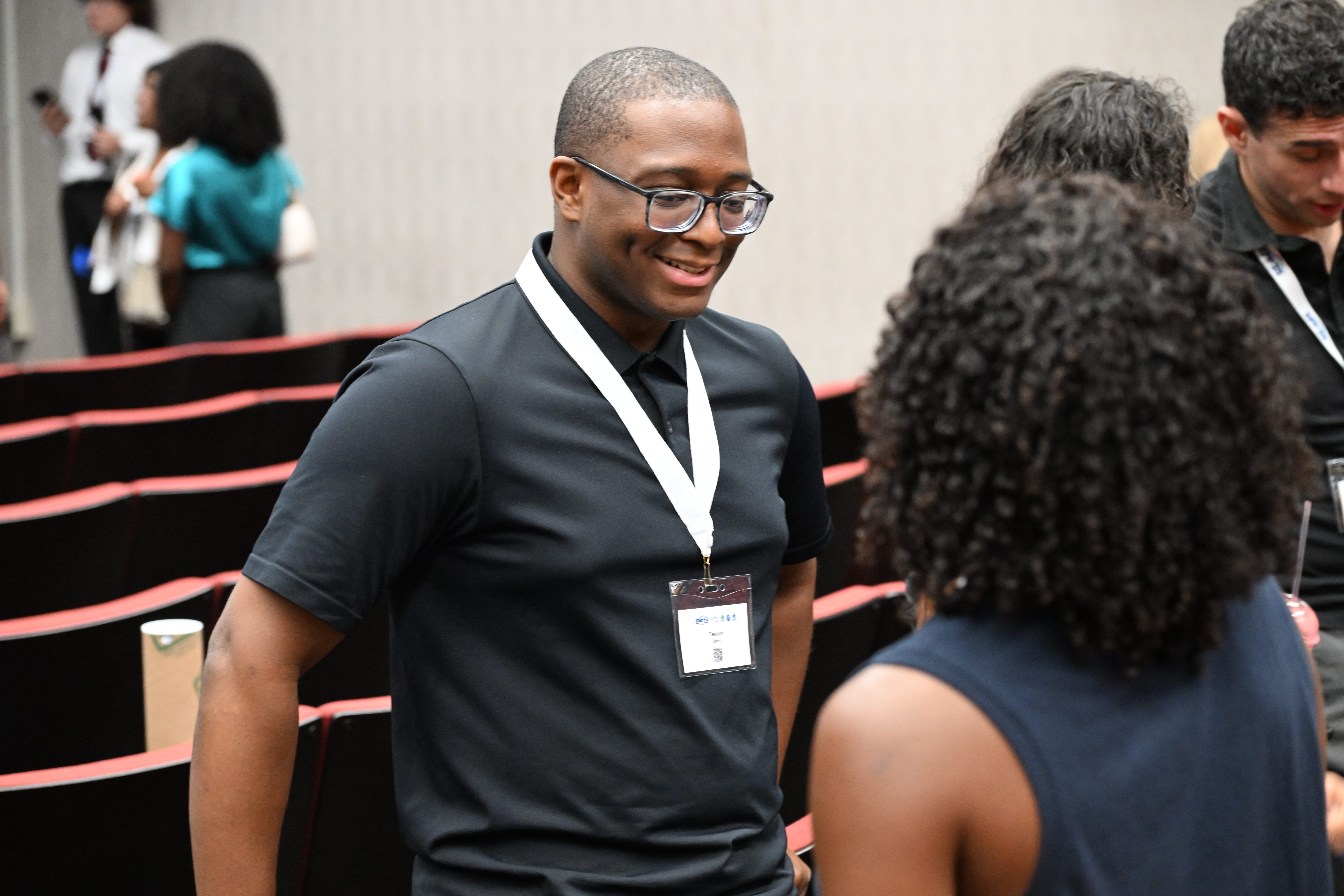 NOAA LMRCSC Alum Teemer Barry networks at the 2026 NOAA EPP Education & Science Forum.