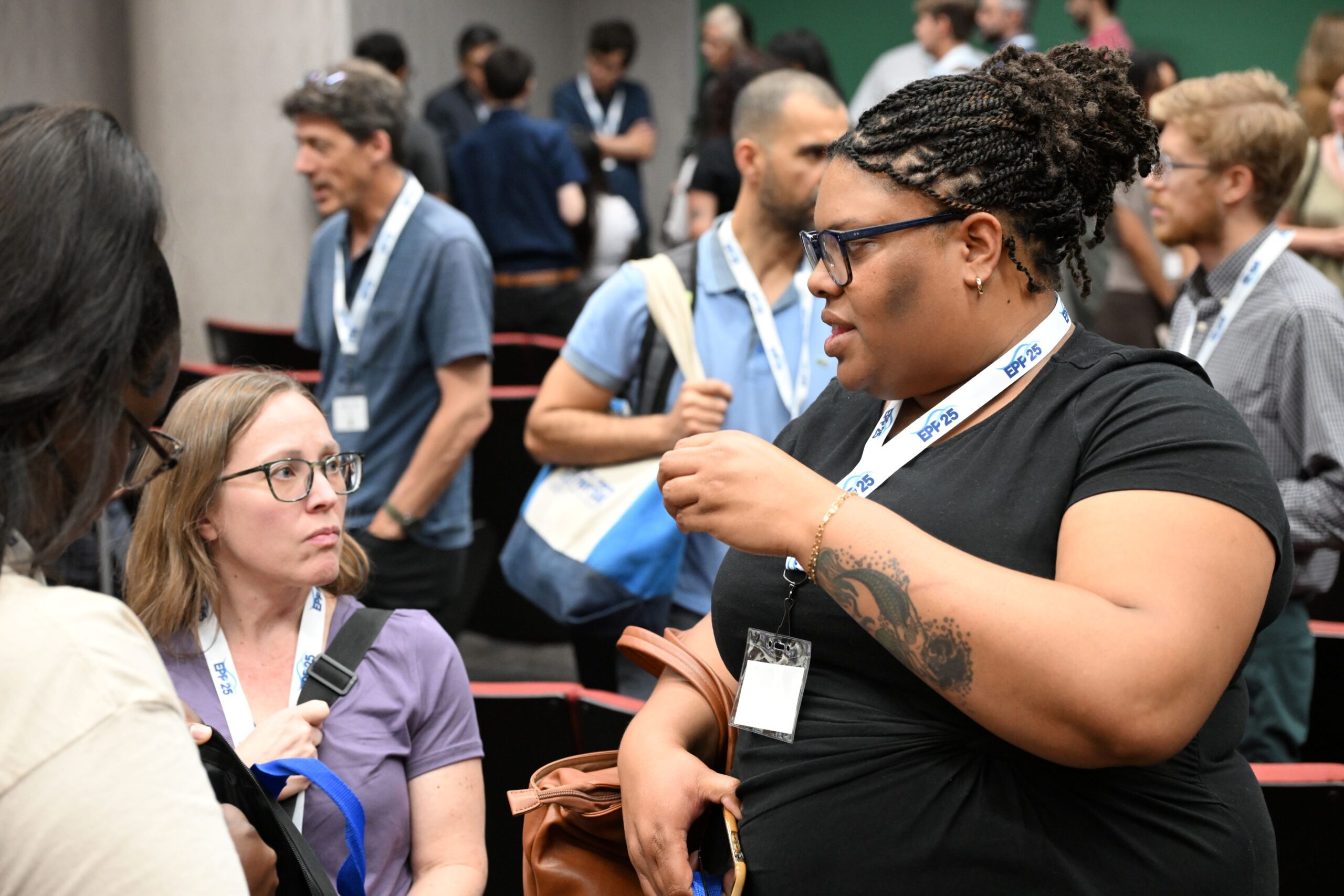 NOAA LMRCSC Ph.D. Fellow Kayland Huckaby (right) chats with UMES Asst. Professor Justine Whitaker at the 2026 NOAA EPP Education & Science Forum.