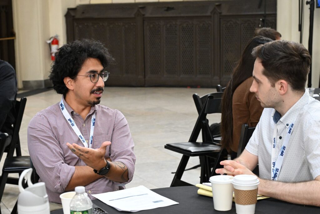 LMRCSC Fellow Raul Flamenco (left) role plays a job interview during a workshop at the 2026 NOAA EPP forum.