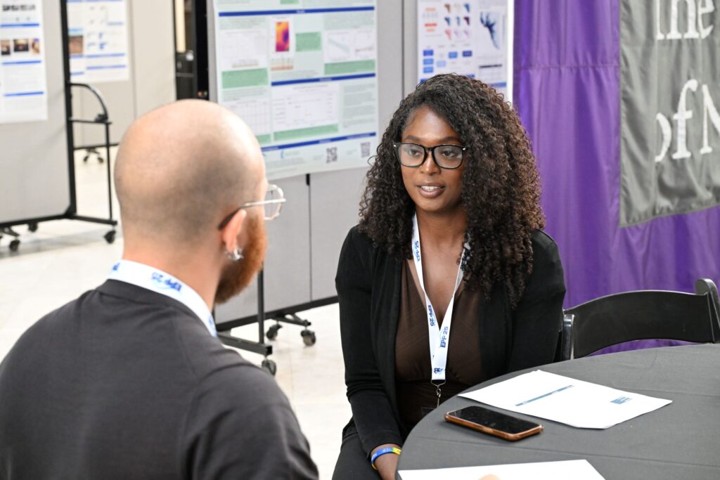 LMRCSC Fellow Kayla Adams role plays a job interview during a workshop at the 2026 NOAA EPP forum.