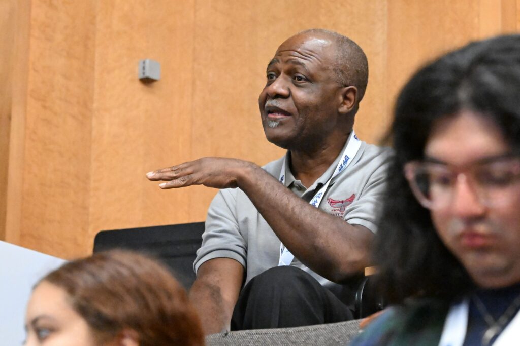 LMRCSC Director Dr. Paulinus Chigbu asks a question during a research presentation at the 2026 NOAA EPP forum.