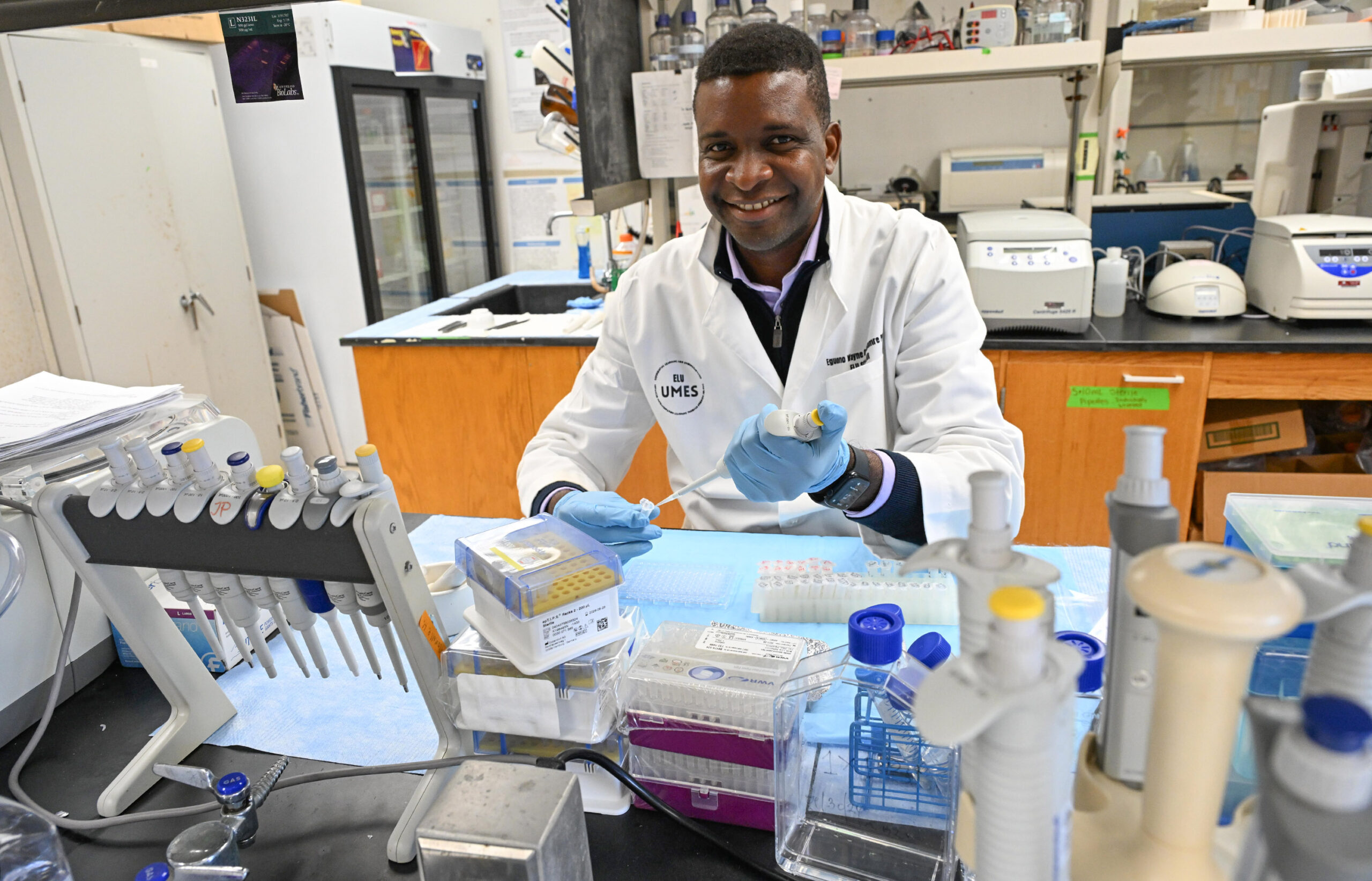 Dr. Wayne Omagamre, assistant professor of biology, tests water for PAFS in his lab at University of Maryland Eastern Shore.