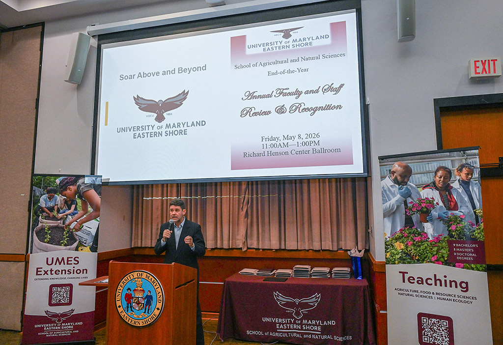 Associate Dean Dr. Vagner Benedito speaks at the SANS end of the year awards event.