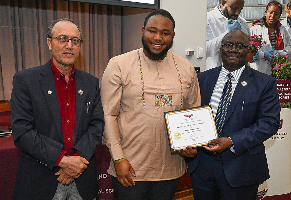 Mouhamadou Lamine Diack with Dean Dr. Moses T. Kairo and Dr. Lila Karki at SANS end of the year awards ceremony.