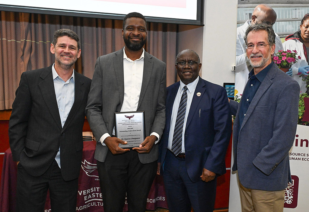 Outstanding Achievement Award winner Dr. Eguono Omagamre with Dean Moses T. Kairo, Associate Dean Dr. Vagner Benedito and Department of Natural Sciences Chair Dr. Jonathan Cumming.