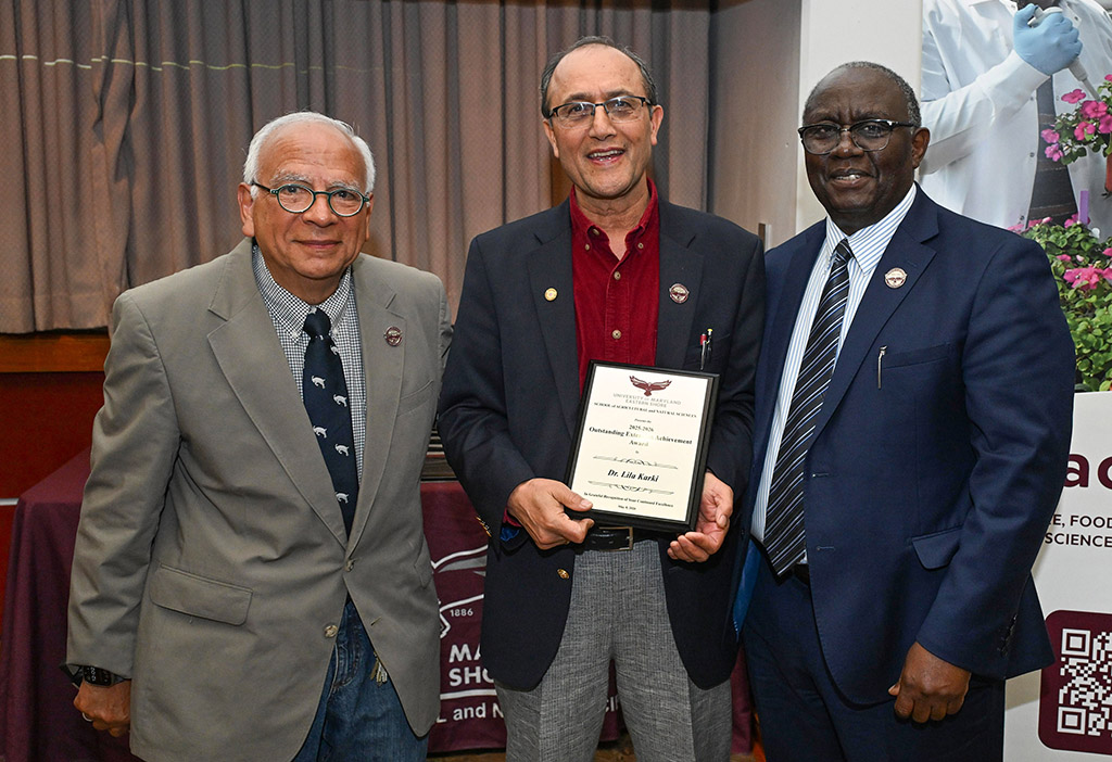 UMES Extension Outstanding Achievement Award winner Dr. Lila Karki with Dean Dr. Moses T. Kairo and Associate Dean Dr. E.N. Escobar