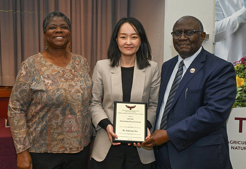 Human Ecology Outstanding Research Award winner Dr. Sukyung Seo with Dean Dr. Moses T. Kairo and Chair Dr. Grace Namwamba.