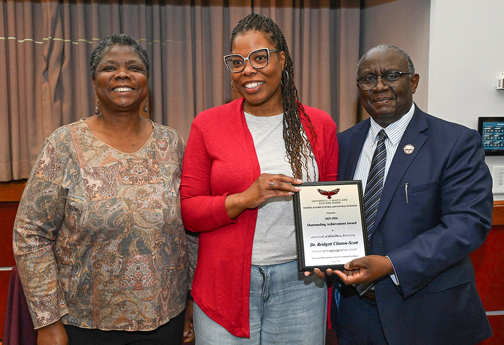 Outstanding Achievement Award winner Bridgett Clinton-Scott with Dean Dr. Moses T. Kairo and Human Ecology Chair Dr. Grace Namwamba.