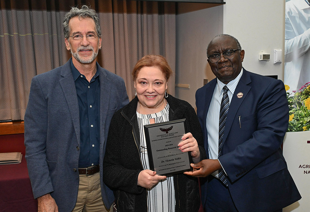 Department of Natural Sciences Outstanding Research Award winner Dr. Victoria Volkis with Dean Dr. Moses T. Kairo and Chair Dr. Jonathan Cumming .