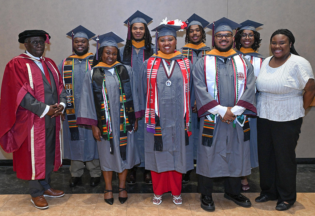 School of Agricultural and Natural Sciences Dean Dr. Moses T. Kairo is pictured with 2026 Spring land-grant scholars at the 139th UMES Commencement. Logan Quinn, Coordinator of Recruitment, Retention and Experiential Learning Activities, is at right.