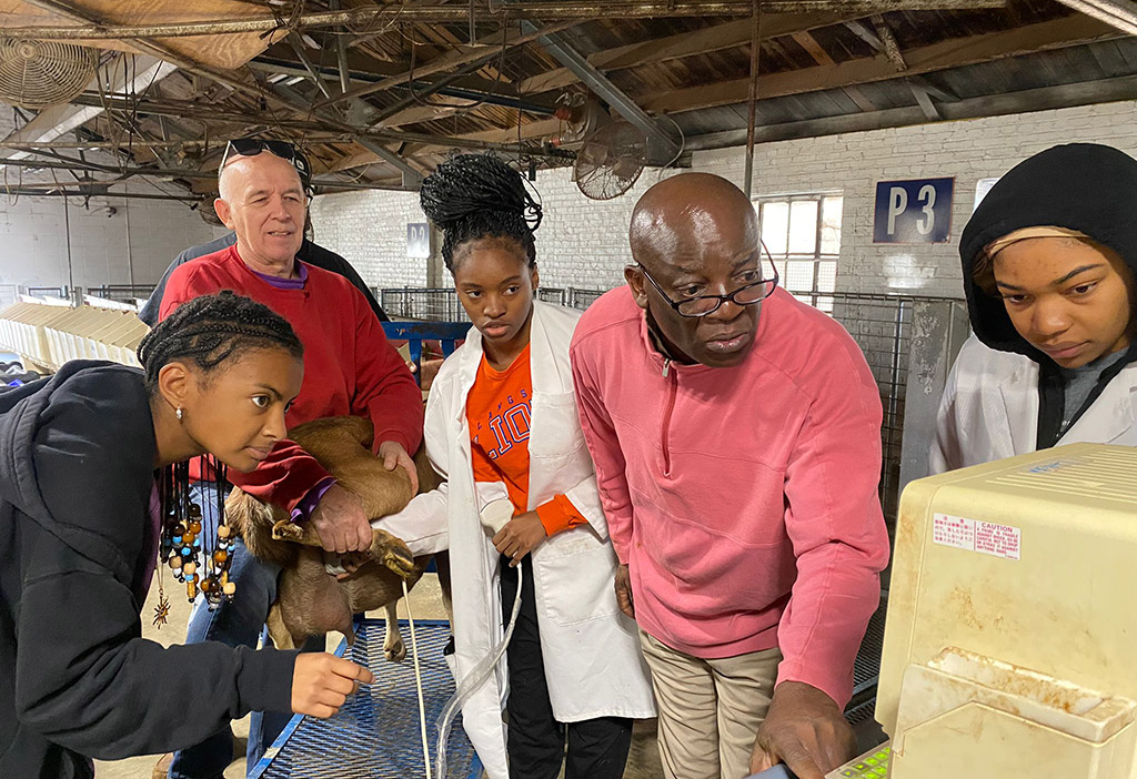 Langston University students evaluate the efficiency of low‑cost pregnancy ultrasound device.