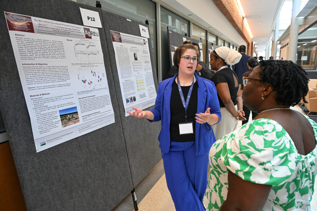 A student participating in UMES' 2026 Summer Research Symposium talks about her project.