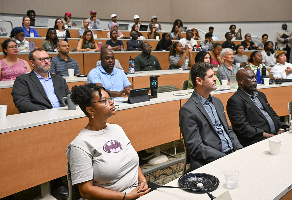 Attendees listen to presentation by Dr. Daniel Kammen.