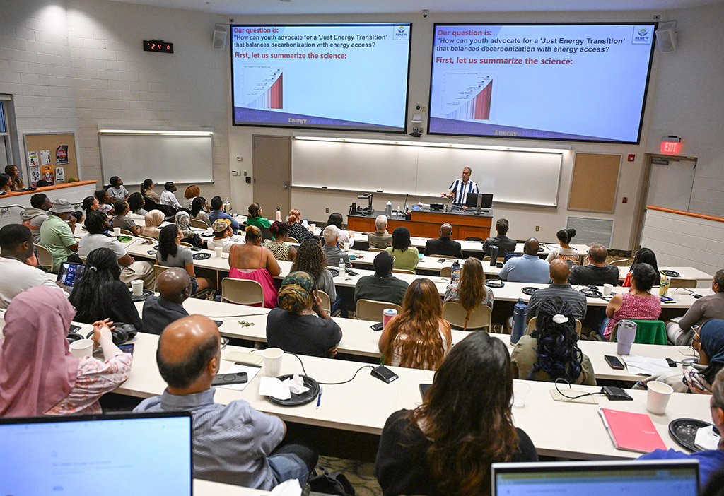 Attendees listen to presentation by Dr. Daniel Kammen.