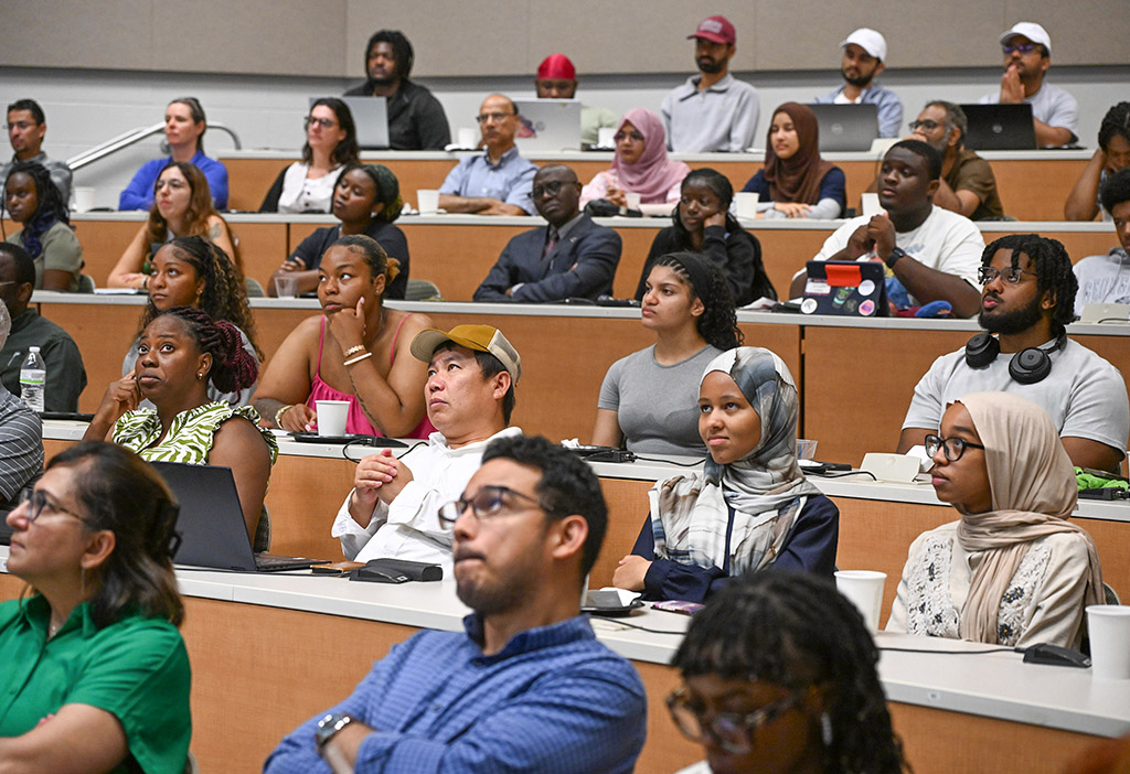 Attendees listen to presentation by Dr. Daniel Kammen.