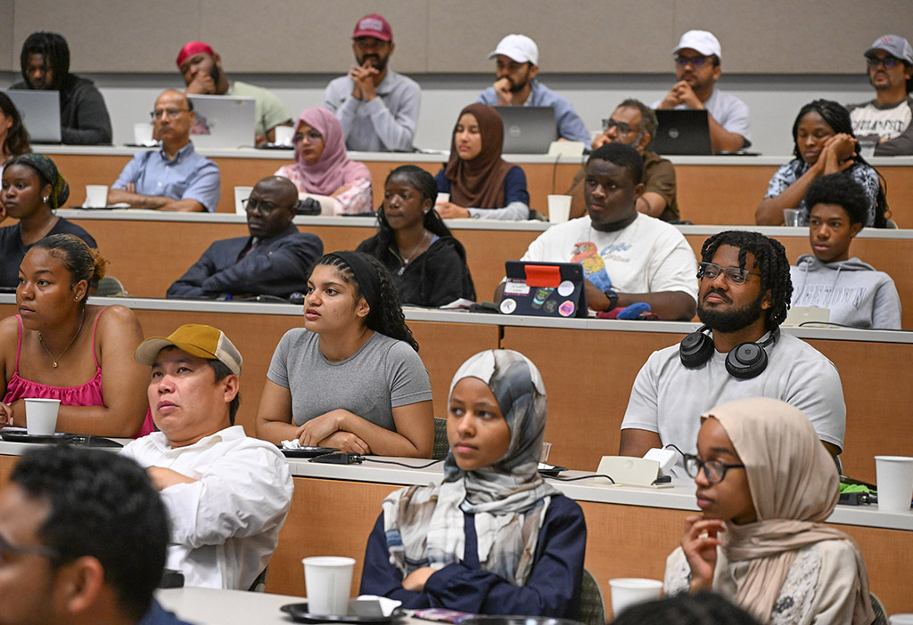 Attendees listen to presentation by Dr. Daniel Kammen.