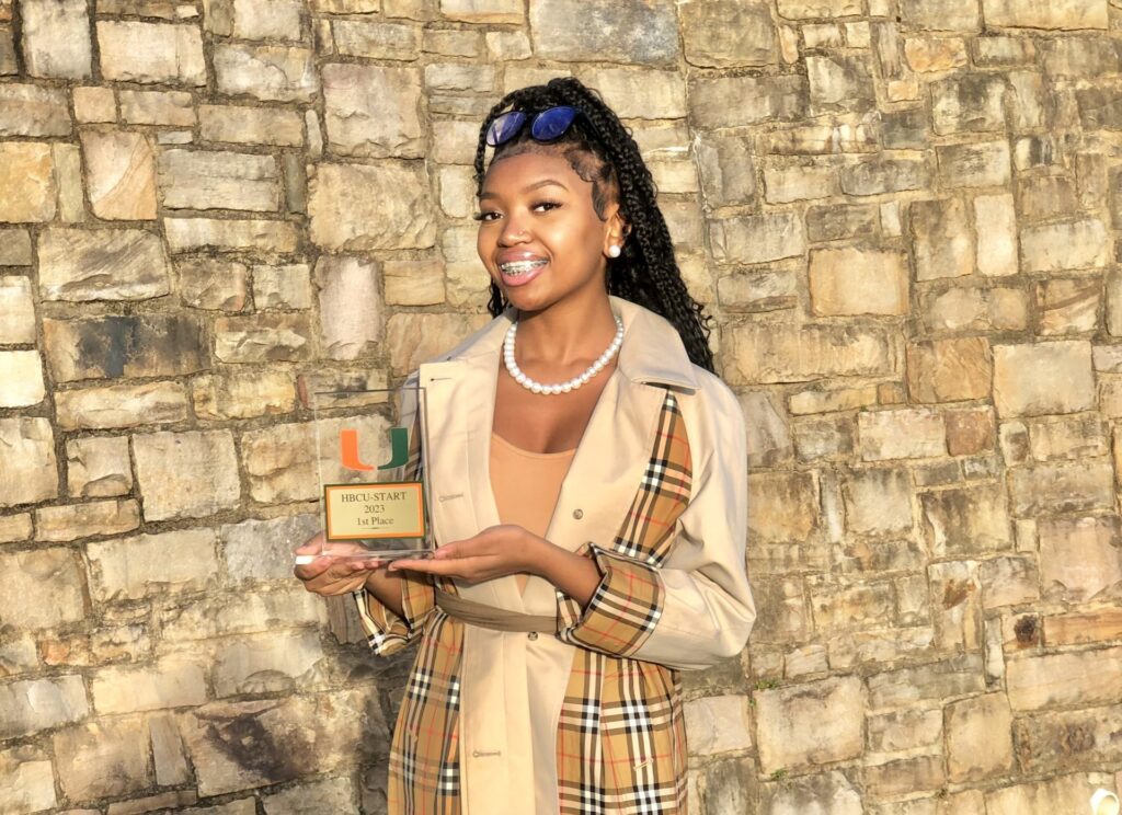 Woman holding trophy