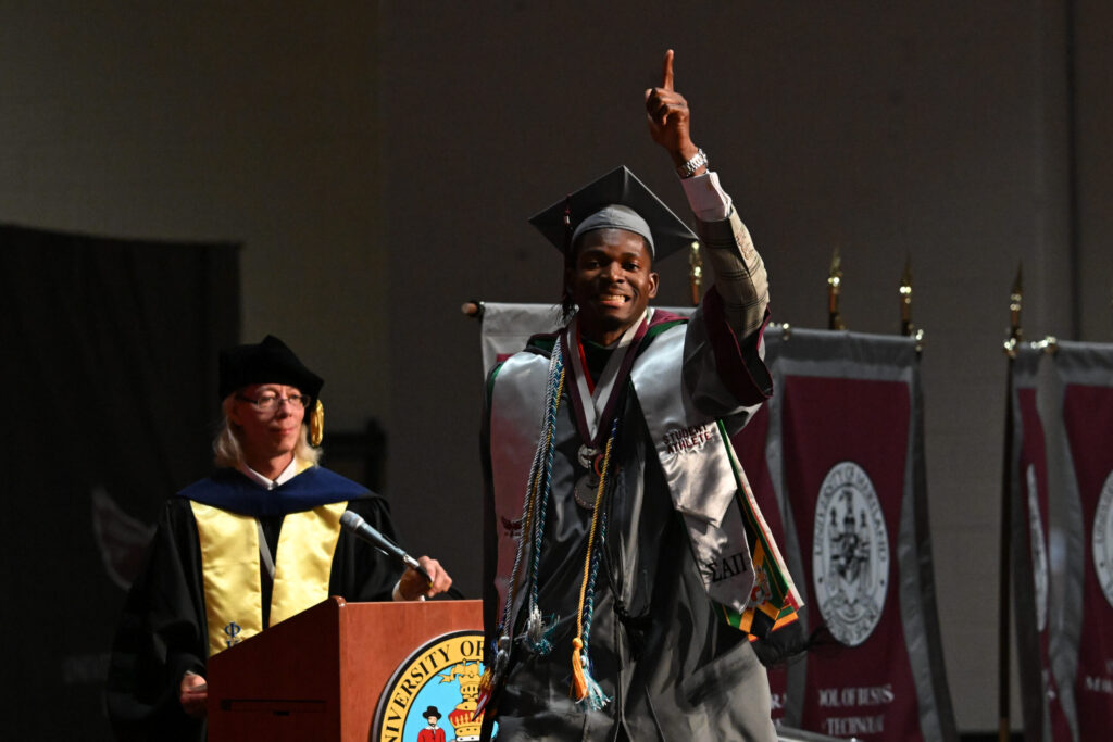 College student celebrating graduation