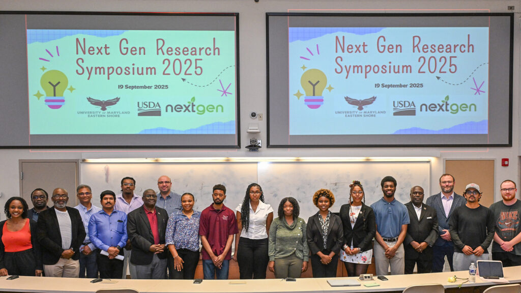 UMES NextGen interns pose for a photo with School of Agricultural and Natural Sciences Dean Dr. Moses T. Kairo and SANS faculty members at the NextGen Research Symposium 2025.